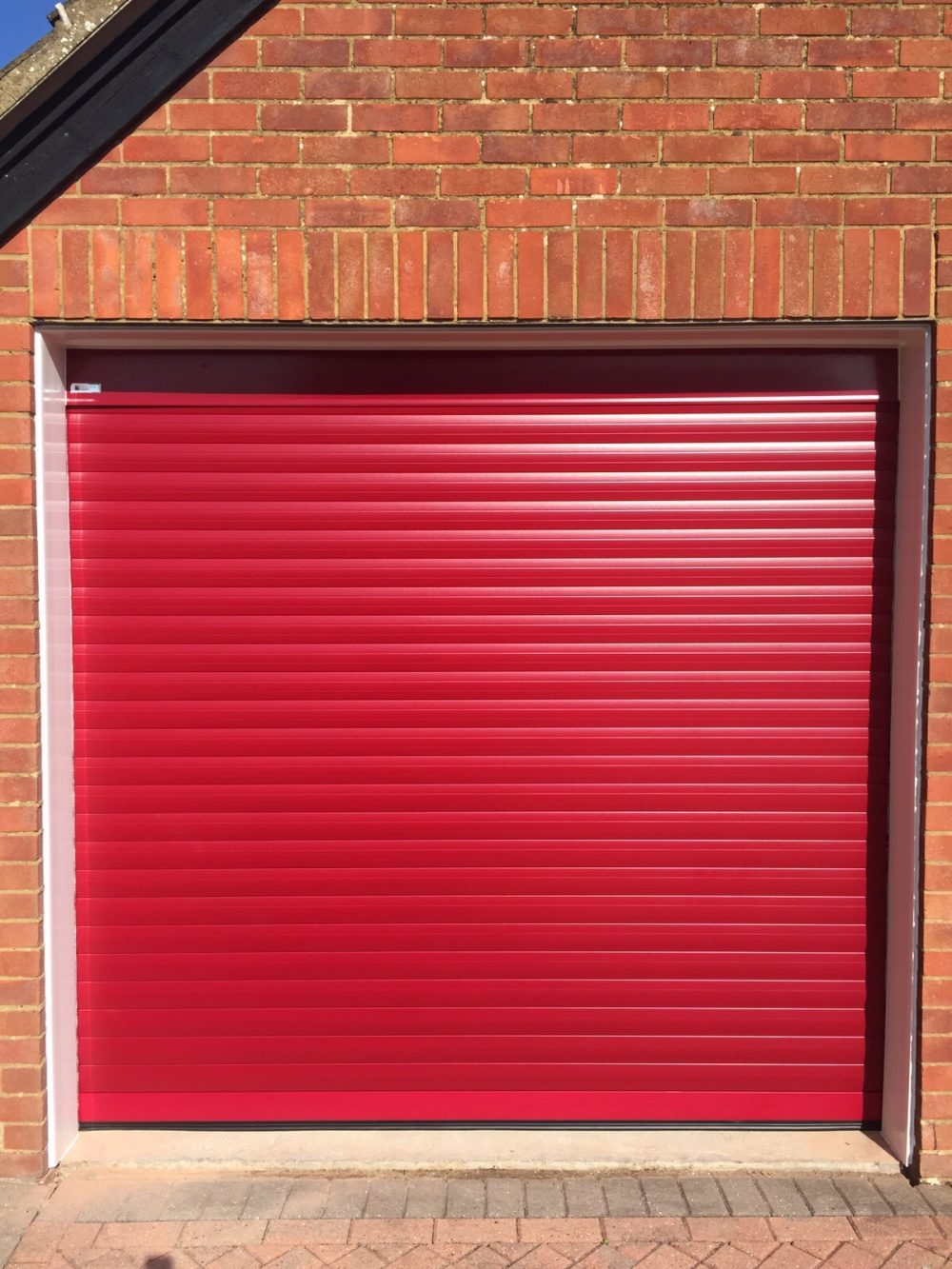 Red Seceuroglide Roller Garage Door fitted by Shutter Spec Security in Chinnor