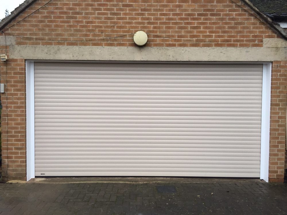 Seceuroglide Roller Garage Door in Cream colour fitted in Oxford by Shutter Spec Security