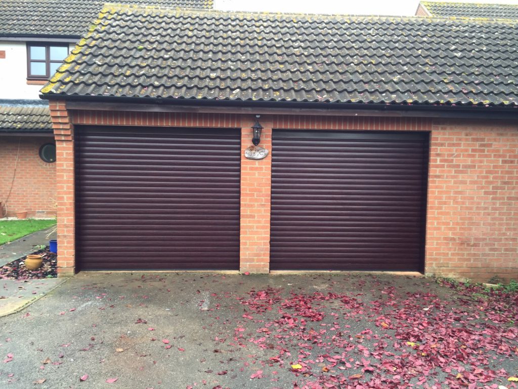 Rosewood SeceuroGlide roller garage doors fitted in thame, oxfordshire by Shutter Spec Security
