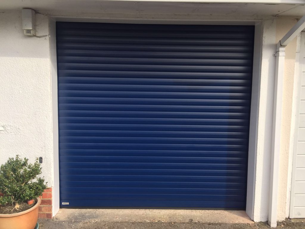 Navy Blue SeceuroGlide Roller Garage Door installed in Princes Risborough by Shutter Spec Security